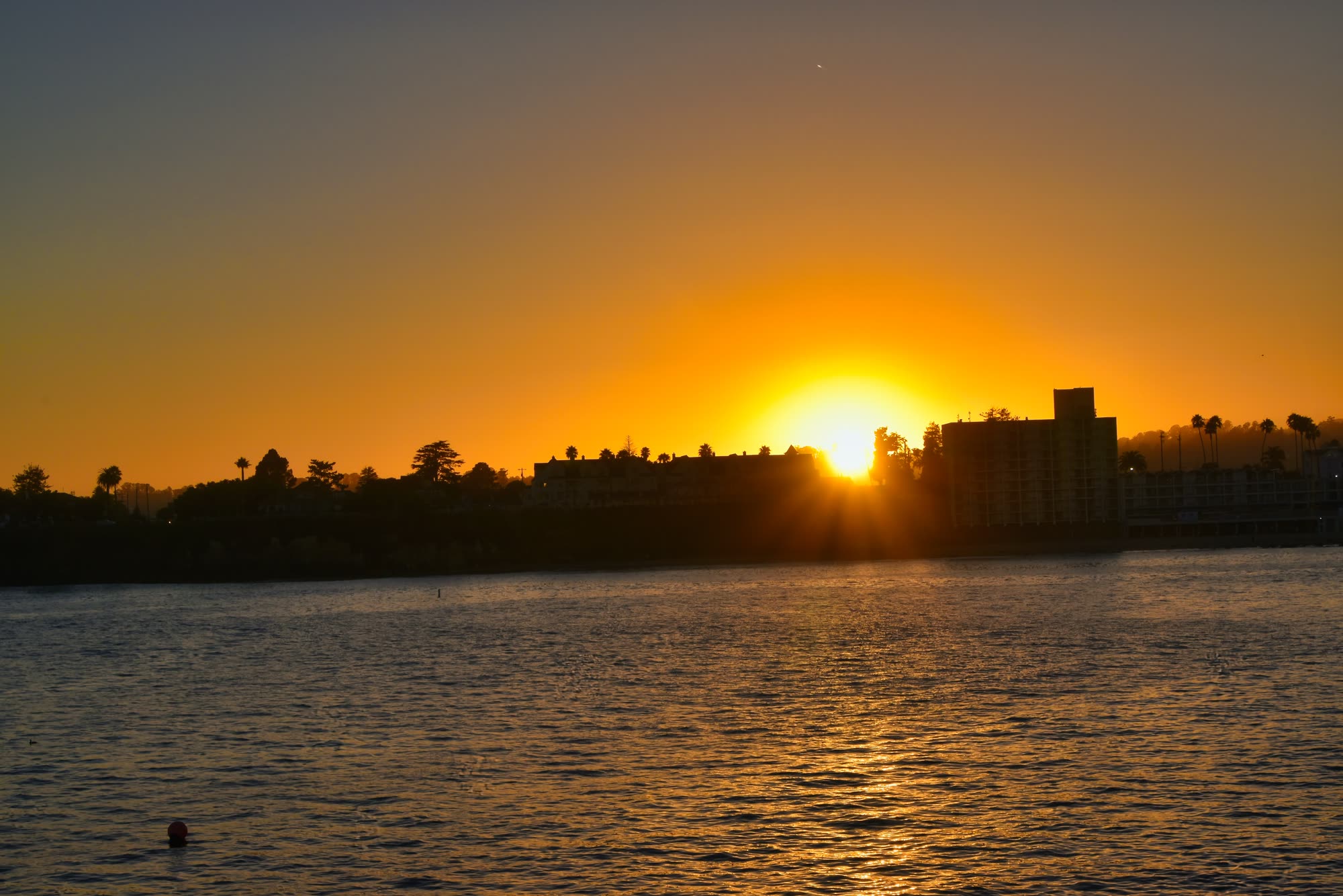 Sunset over the harbor in Santa Cruz, California